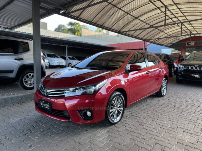 TOYOTA - COROLLA - 2014/2015 - Vermelha - R$ 84.500,00