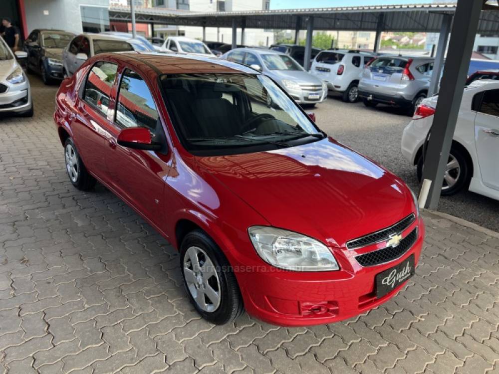 CHEVROLET - PRISMA - 2011/2012 - Vermelha - R$ 36.900,00